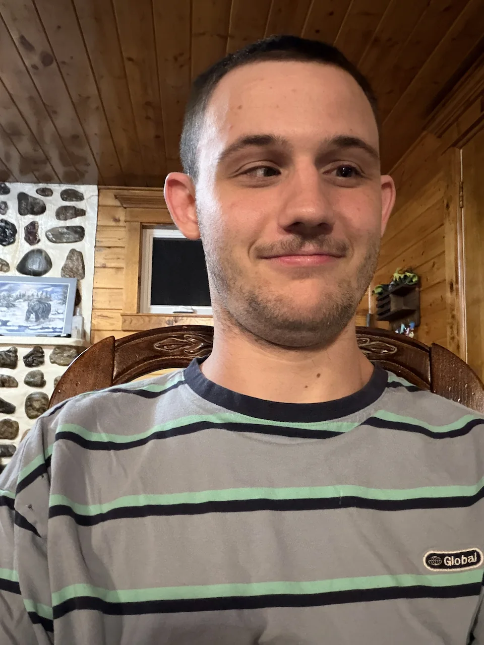A recent portrait of Ty in a striped shirt